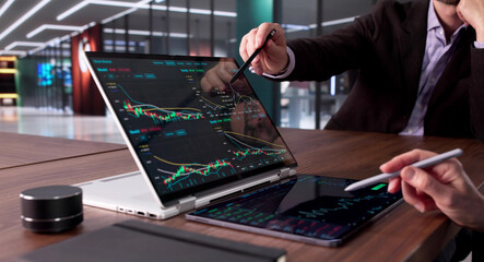 Male Financial Agent Working With Female Colleague