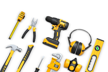 Construction tools and safety equipment shown on white background. Concept of work safety and building tools