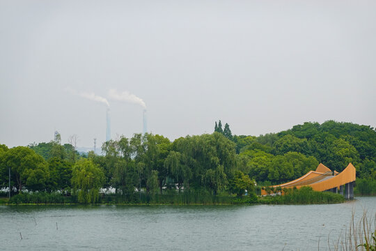 Wide lake vista under soft overcast sky today