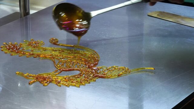  sugar painting a phoenix pattern,Chinese traditional intangible cultural heritage handmade