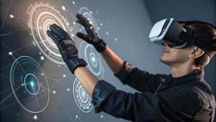 A person wearing a virtual reality headset interacts with digital graphics, showcasing advanced technology and immersive experiences.