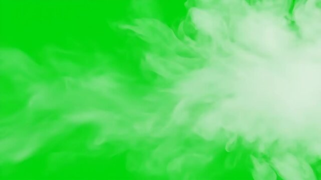 Fog or Smoke on Green Background - A swirling cloud of white smoke or fog against a bright green background.