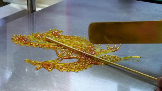 sugar painting a phoenix pattern,Chinese traditional intangible cultural heritage handmade
