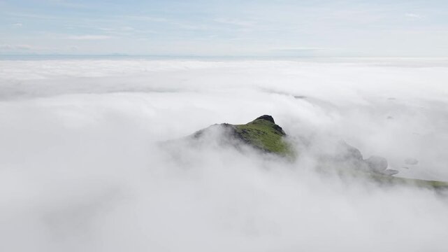 Nonstinden Covered In Clouds, A Beautiful Mountain Near Ballstad In The Lofoten Islands - Drone Shot
