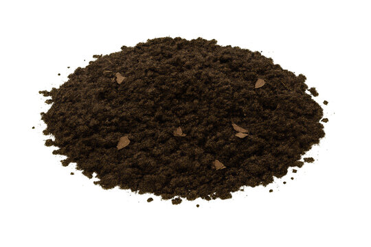 Pile of dark rich potting soil with small leaf bits on a transparent background