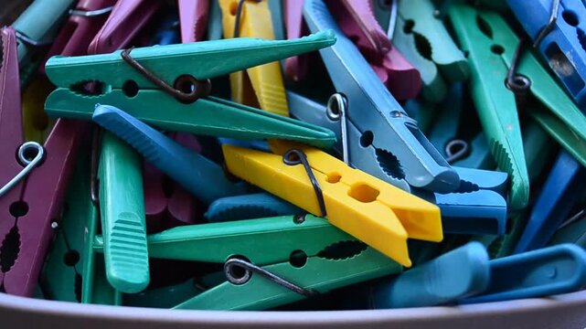 colorful clothes pins on white background
