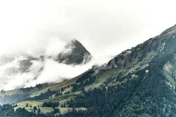 Swiss Alps in Summer with Dramatic Clouds