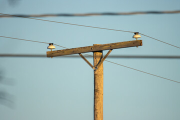 power lines and wires with blue sky