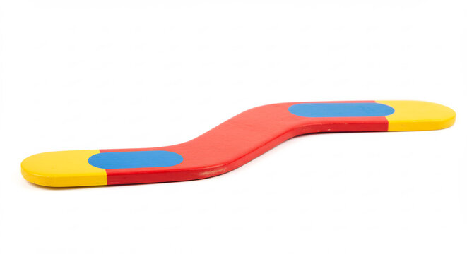 Jouet de lancer color� rouge bleu jaune s'envolant sur fond blanc �clatant id�al pour jeux d'ext�rieur amusants. AI Generated