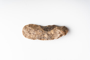 Ancient Paleolithic Flint Biface Knife from Algeria, Prehistoric Stone Tool and Early Human Technology. white background