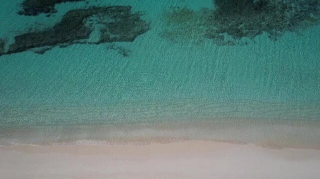 Natural Sand Wave Patterns Along a Quiet Sandy Beach in Okinawa