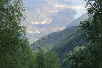 Obraz premium Mountain landscape of the North Caucasus mountains near Mount Elbrus on a sunny summer day