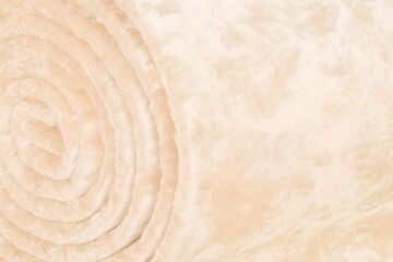 rolled beige soft plush fabric texture © MD
