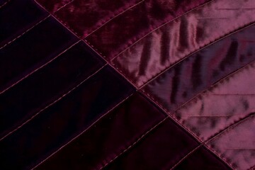 Naklejka premium luxurious dark plum velvet quilted fabric texture with diamond stitching