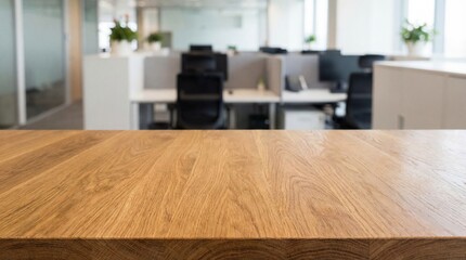 A close-up shot of a wooden table in an office setting, with a blurred office background 