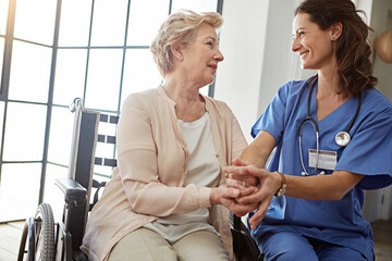 Obraz premium Retirement home, wheelchair and nurse with old woman, talking and support for recovery. Pensioner, caregiver and person with disability, wellness and medical service for mobility assistance and smile