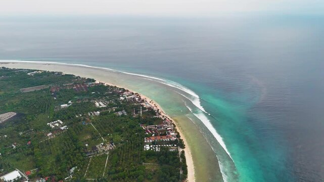 Aerial view of the Gili Islands off the coast of Lombok, Indonesia. The Gilis are a popular holiday destination for tourists visiting Bali and Lombok.	
