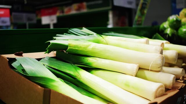 Fresh leeks on display at a local market during the afternoon hours