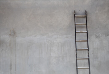 Ladder Against Concrete Wall