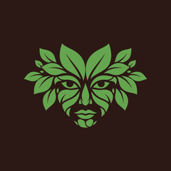 Artistic illustration of a human face integrated with green leaves forming hair.