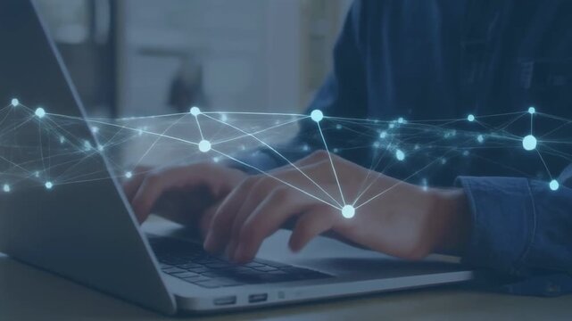 Close-up of hands typing on a laptop keyboard, with a glowing abstract network graph overlay