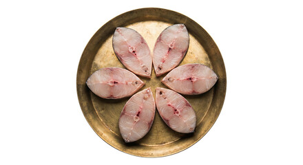 Fresh Raw Kingfish Steaks Arranged in Flower Pattern on Traditional Brass Plate Isolated on White Background