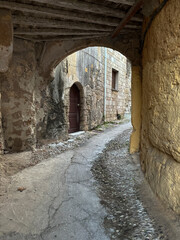 Fototapeta premium old empty street in rhodes oldtown