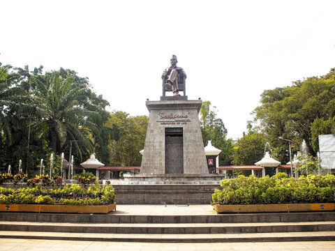 Solo Indonesia, July 3, 2025. Historical Monument of President Sukarno in Public Park with Fountains and Tropical Foliage