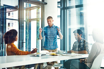 Obraz premium Glass, presentation and people in workplace, creative agency and pitch for business growth. Speaker, men and women in meeting coworking and feedback for proposal, brainstorming and ideas for project