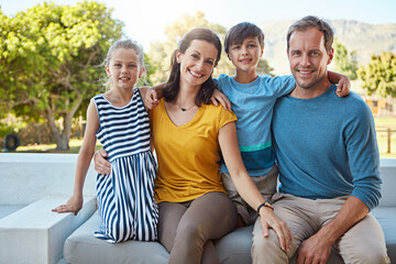 Mom, dad and children in backyard with portrait, connection or bonding on summer break. Happy,...