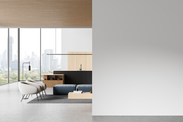 Fototapeta premium Modern bright interior with empty wall for poster mockup or branding display in open space apartment with city view and minimalist design concept. 3D Rendering