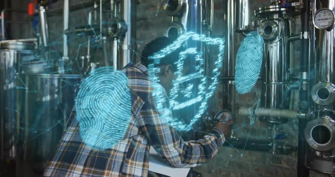 Process engineer checking valve in processing bay, scanning fingerprint hologram ensuring security