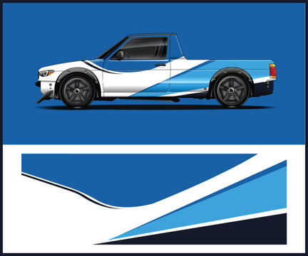 White pickup truck with blue and silver graphics