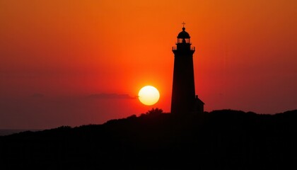 Silhouette of a Lighthouse Against a Vibrant Sunset Over the Ocean Horizon