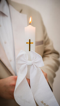 Closeup photo of a candle at a baptism