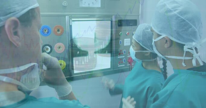 Financial data processing over team of diverse surgeons discussing in operation theatre