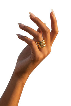 Elegant female hand with gold rings isolated. Jewelry fashion.