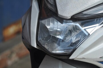 Motorcycle Headlight Close-Up with Modern Design Detail