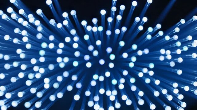Extreme macro of blue fiber optic cables glowing and transmitting data with bokeh light effects on a dark background for tech concepts