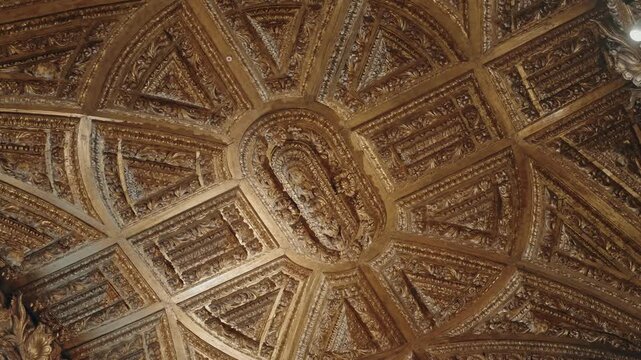 Gilded baroque carved ceiling detail inside Santa Clara Church Porto