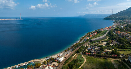 Obraz premium Aerial view of the narrowest point of the Strait of Messina, in southern Italy. This sea channel lies between Capo Peloro near Messina, Sicily, and Torre Cavallo, near Villa San Giovanni, Calabria.