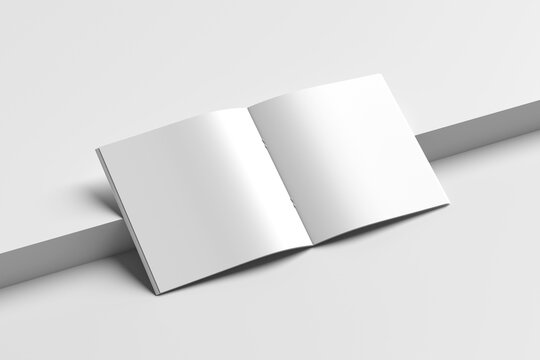 A square mockup of a magazine, brochure, or book with blank pages and realistic perspective shadows resting on a tiered background.