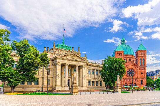 Palais de Justice palace neo-Greek and Eglise Saint-Pierre-le-Jeune Catholic Church Romanesque Revival architecture in old town Strasbourg city centre Neustadt district, Alsace region, France