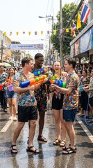 Friends enjoying a vibrant water fight festival.