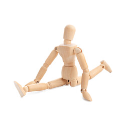 One wooden mannequin posing on white background