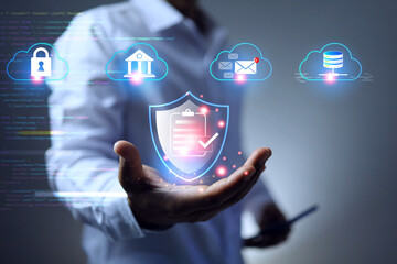 cyber security concept with a man in white holding protection shield represents protect information or data in cloud from hacker scammer cyber crime or data breach