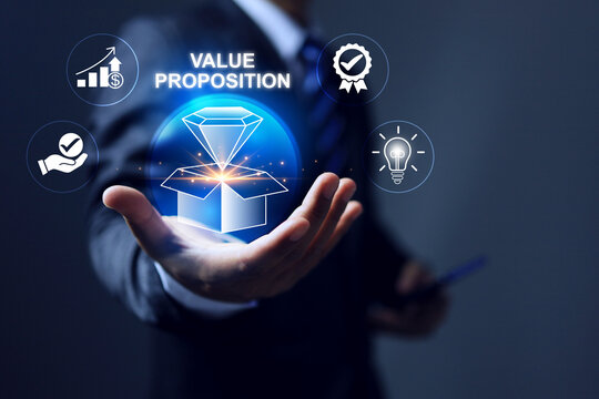 value proposition concept with businessman holding box and diamond represents get business advantage by core value activity such as quality, creativity, honesty and right
