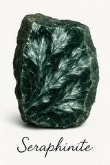 Raw seraphinite rock sample displaying characteristic shimmering needle formations