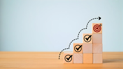 Visualizing Business Growth and Achievement Wooden Blocks Symbolizing Success and Goal Attainment