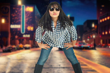 A woman in a purple plaid shirt